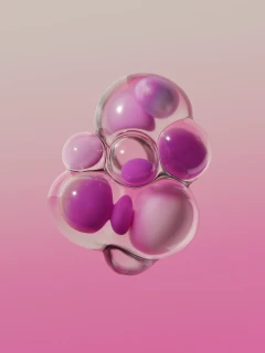 Visuel 3D de sphères roses translucides, généré à l'aide de l'IA